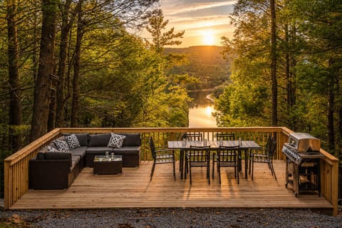 Fire up the grill and set the table for a group dinner with a river view. Once the food's ready, kick back on the sectional with the pillows and let the sunset over the water do the rest of the work.