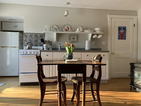 A comfortable space, nestled in the woods, but within walking distance of town.