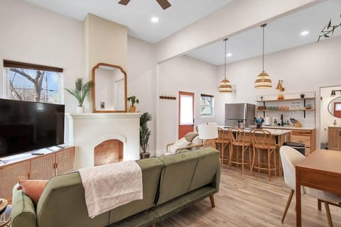 Open Living Space with 55" Smart TV,  Kitchen with bar