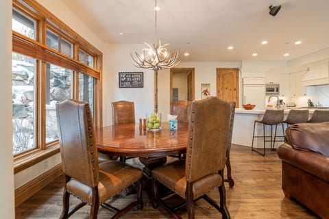 Dining area offers a table with seating for six