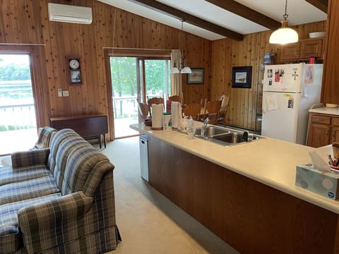 Open kitchen, dining, living room.