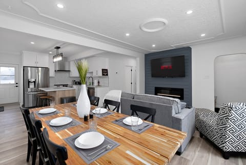This open concept space features a spacious dining area with a large table.