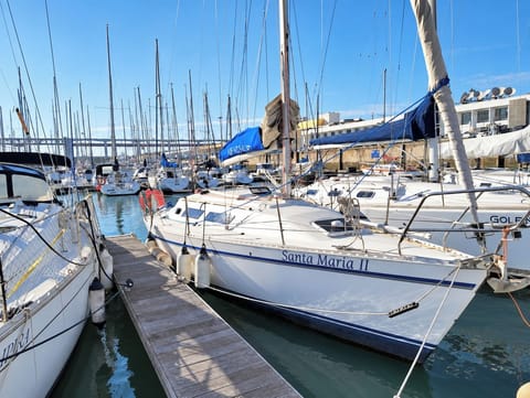 Santa Maria II moored at the marina, ready for a distinctive stay on the water.