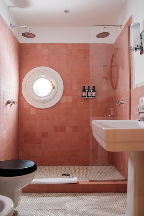 Shower, rainfall showerhead, eco-friendly toiletries, hair dryer