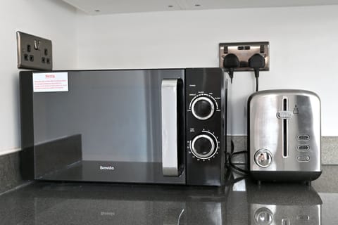 Microwave and toaster.