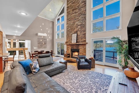 Living Room on the main level. Soaring ceilings, floor to ceiling glass. 