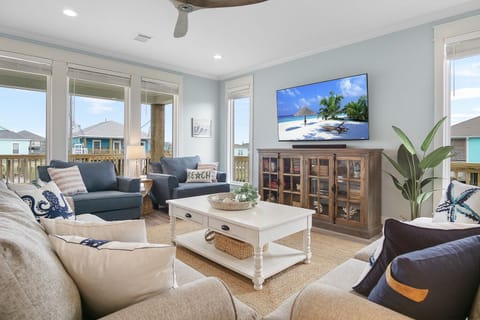 Creature comforts include a 65" Roku TV, extra seating, and board games!