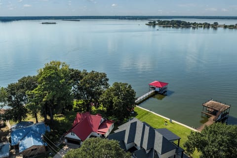 Enjoy our lake point with 160' feet of unobstructed water front and shade.