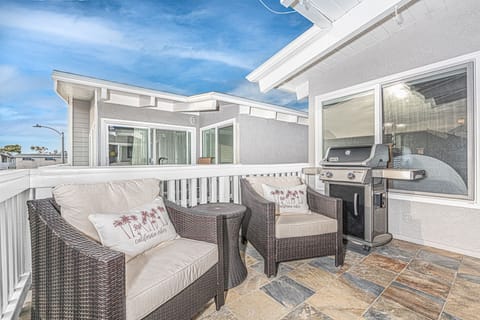Enjoy morning coffee, a good book, or happy hours on the front balcony.
                