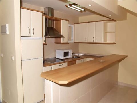 Apartment, 1 Bedroom | Private kitchen | Fridge, microwave, stovetop, electric kettle