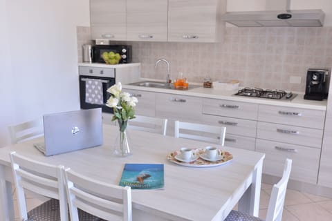 Full-size fridge, microwave, oven, espresso maker