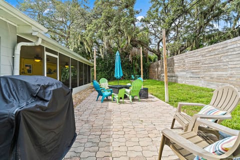 Back patio with grill and fire pit