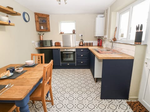 Fridge, electric kettle, toaster, cookware/dishes/utensils