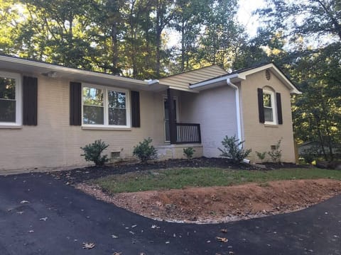 Front of home with parking for up to 5 cars