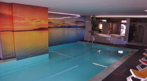 Indoor pool, seasonal outdoor pool, sun loungers
