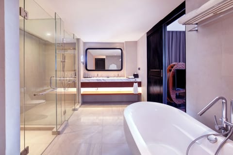 Executive Suite, 1 King Bed | Bathroom | Separate tub and shower, eco-friendly toiletries, hair dryer, bathrobes
