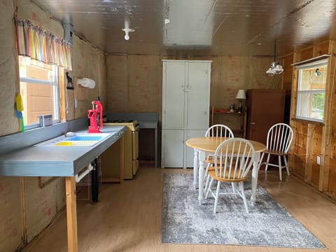 Guest cabin, kitchen and dining area