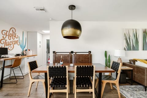 Dining table for 7, softly lit for dinners and meaningful conversation.