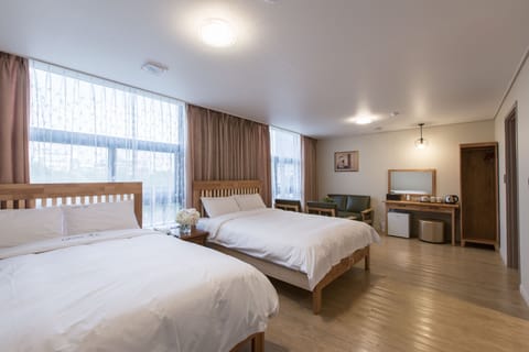 Family Suite | Down comforters, free minibar, individually decorated