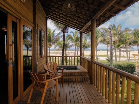 Luxury Bungalow, 1 Bedroom, Jetted Tub, Sea Facing | Minibar, laptop workspace, free WiFi, bed sheets
