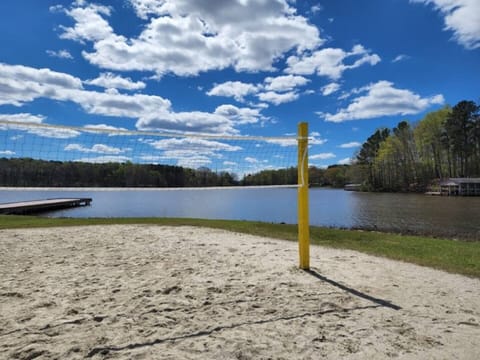 Beach area. 3 minute walk that includes volleyball, Boat Ramp, Basketball, Dock