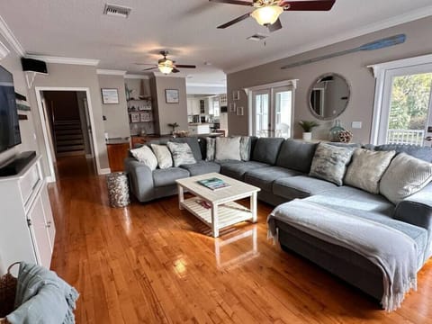 Spacious living room with large sofa. 