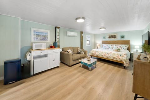 This studio has amenities of high speed internet and a big screen TV.