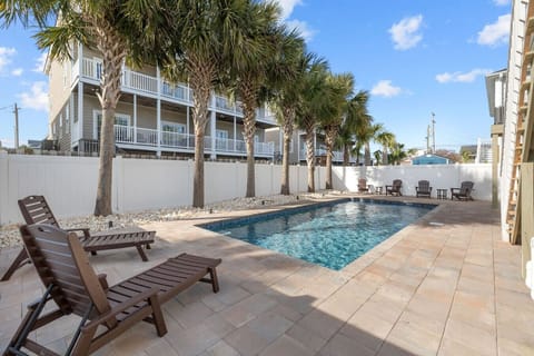 : Relax by your private, salt-water pool, a tranquil escape just outside your door.