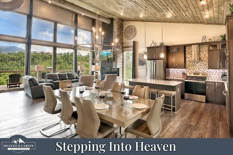 Expansive living space with floor to ceiling windows to admire the mountain view