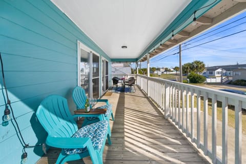 Step into paradise and soak up the warm Florida breeze on this charming front deck, where relaxation and tranquility await.