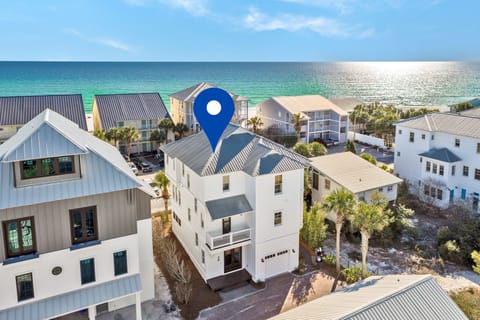 Steps from the beach at "Seaside Sister"; the ocean views, white sands and the community pool are awaiting your arrival!