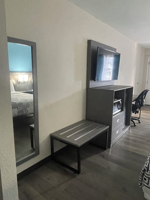 Blackout drapes, iron/ironing board, bed sheets