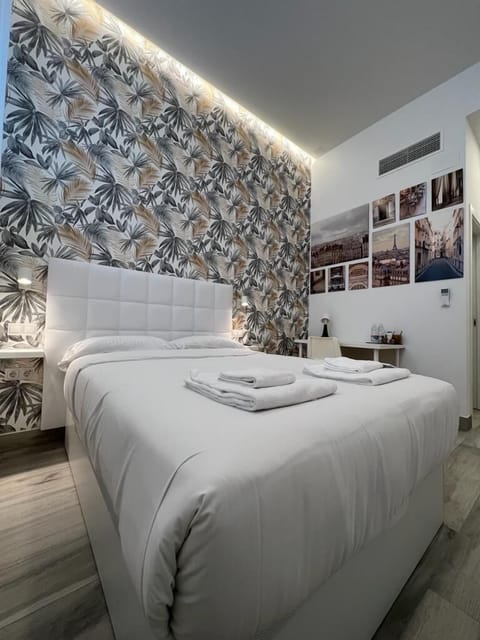Premium bedding, down comforters, memory foam beds, desk