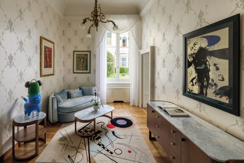 Suite, Lake View (Suite Arte - Adults Only - No Pets) | Living area | 30-inch flat-screen TV with satellite channels, TV