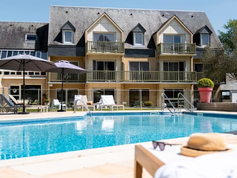 Outdoor pool, open 9:00 AM to 9:00 PM, pool umbrellas, sun loungers