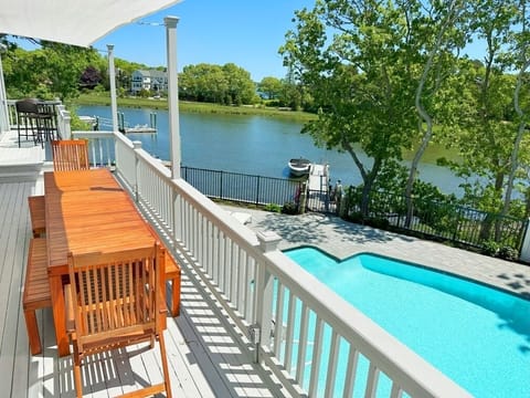 Outdoor seating for 12 with water views