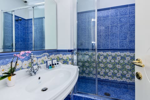 Free toiletries, hair dryer, bathrobes, slippers