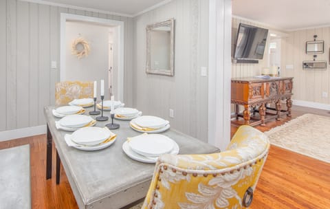 Dining room seats 6 people comfortably with a breakfast bar within view that seats an additional 3 people.