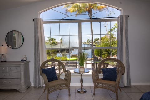 Enjoy coffee in your master suite with this exquisite view of the canal!
