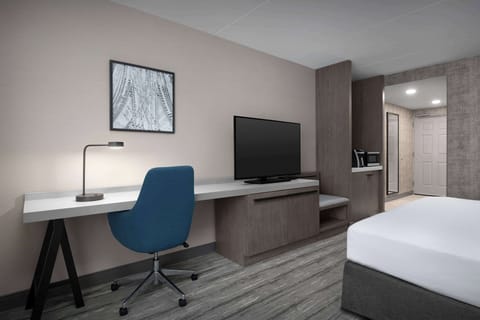 Desk, laptop workspace, blackout drapes, iron/ironing board