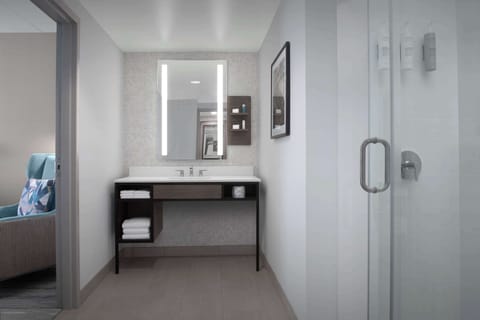 Suite, 1 King Bed | Bathroom | Designer toiletries, hair dryer, towels, soap