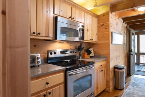 Kitchen is outfitted with smooth top electric range