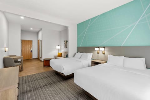 2 Queen Beds, Suite, Nonsmoking, First Floor | Premium bedding, laptop workspace, blackout drapes, soundproofing