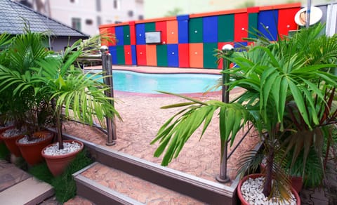Outdoor pool, pool umbrellas, sun loungers