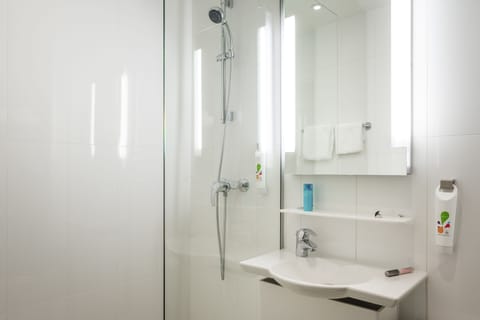 Shower, eco-friendly toiletries, hair dryer, towels