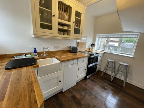Kitchen | Complete with oven, grill, microwave, dishwasher & washer dryer.
