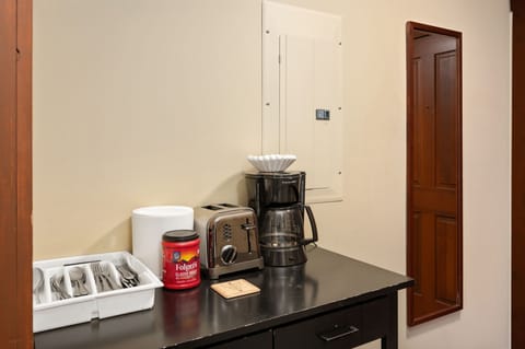 Make yourself at home with the kitchenette, featuring a coffee maker, toaster, and all the necessary appliances!