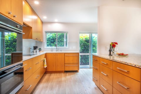 Kitchen with Patio Door to Bar-B-Que.