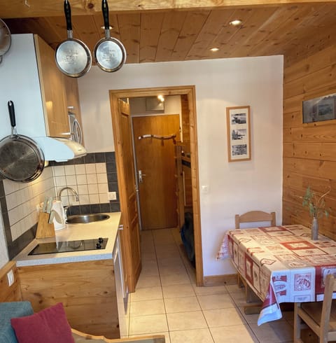 Kitchen/diner and door to bunk bedroom.