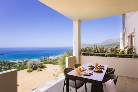 Suite, 1 Bedroom, Sea View | In-room safe, iron/ironing board, free WiFi, bed sheets